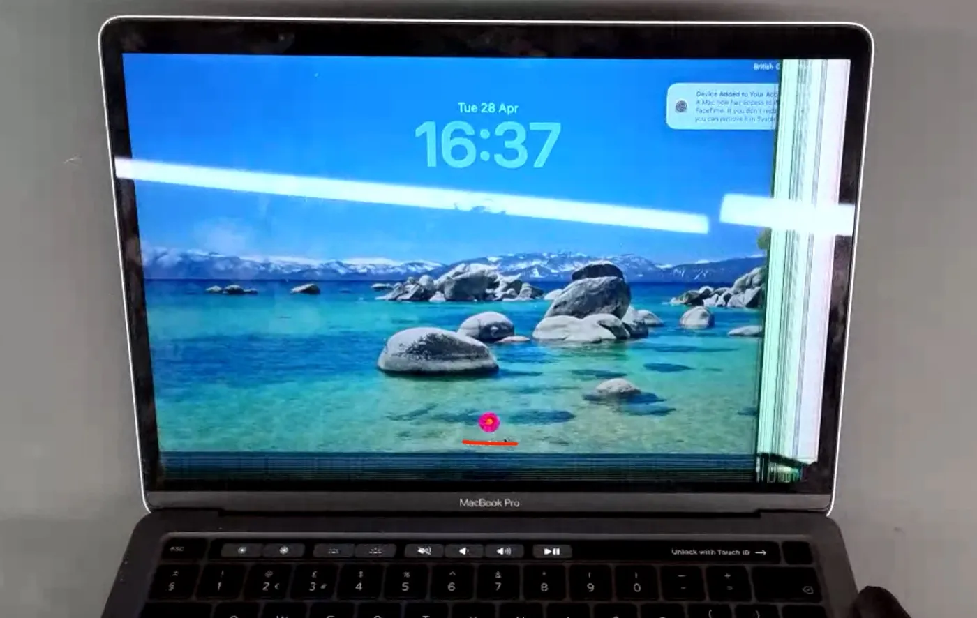 MacBook screen damage example — Backlight bands with coloured lines down one side